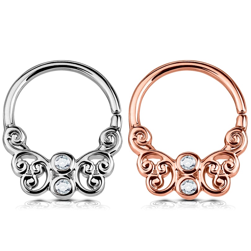Septum piercing s vlnkami ve tvaru motýla