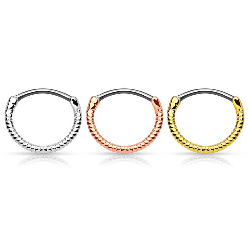 Zakroucený septum piercing