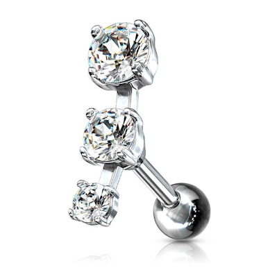 Piercing do ucha se třemi kamínky v řadě