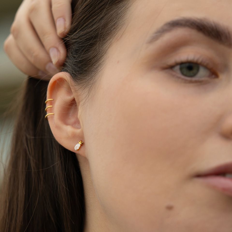 Piercing do pupíku s květinou